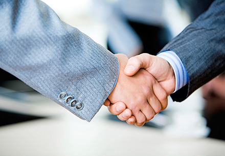 Partners in Education - handshake image