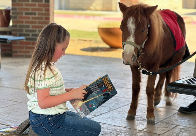 Spears Students Work on Reading Skills With Mini Horses